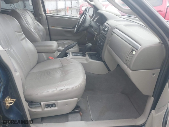 2002 Jeep Grand Cherokee Laredo with VIN 1J4GW48S22C244433, listed as a IAAI auction lot 41892912 with 256,393 mi miles. Bid and sale history available at carsss.com. Image 5.