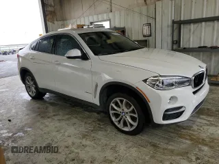 2015 BMW X6 sDrive35i with VIN 5UXKU0C50F0F91865, listed as a Copart auction lot 82128374 with 122,395 mi miles and Salvage Title. Bid and sale history available at carsss.com. Image 4.