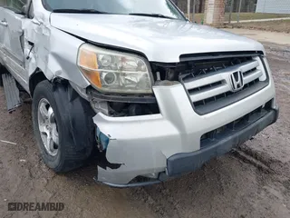2006 Honda Pilot EX with VIN 2HKYF18426H553632, listed as a IAAI auction lot 41656610 with 154,470 mi miles. Bid and sale history available at carsss.com. Image 18.