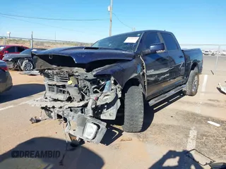 2014 Ram 1500 Sport z VIN 1C6RR6MT3ES366719, wystawiony jako IAAI lot #42228139 z przebiegiem Nie podano mil oraz . Historia ofert i sprzedaży dostępna na DreamBid. Obrazek 17.