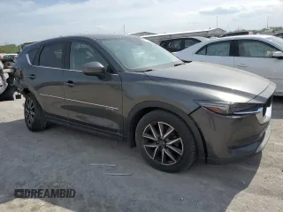 2018 Mazda CX-5 Grand Touring z VIN JM3KFBDM5J0365380, wystawiony jako Copart lot #51040914 z przebiegiem 88 928 mil mil oraz Czysty tytuł • Clean title. Historia ofert i sprzedaży dostępna na DreamBid. Obrazek 4.