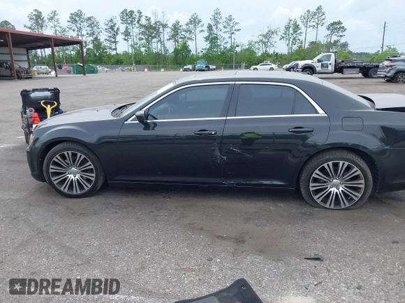2013 Chrysler 300 with VIN 2C3CCABT2DH735764, listed as a IAAI auction lot 41977616 with 164,517 mi miles. Bid and sale history available at carsss.com. Image 14.