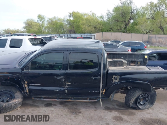 2013 Toyota Tacoma with VIN 5TFLU4EN9DX073331, listed as a IAAI auction lot 42123968 with 145,879 mi miles and . Bid and sale history available at DreamBid. Image 14.