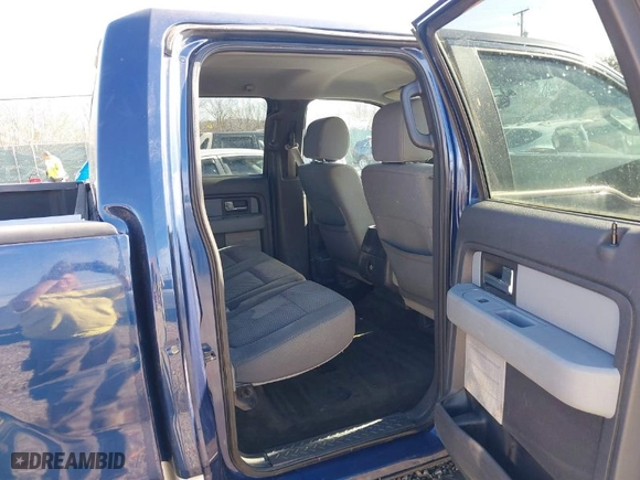 2012 Ford F-150 XL with VIN 1FTFW1EF9CFA55611, listed as a IAAI auction lot 41616943 with 103,749 mi miles. Bid and sale history available at carsss.com. Image 8.
