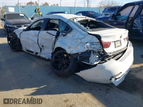 2015 BMW 4 Series 435i with VIN WBA4B1C54FD954791, listed as a IAAI auction lot 41590919 with 133,439 mi miles and . Bid and sale history available at carsss.com. Image 3.