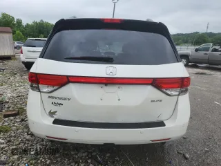 2014 Honda Odyssey Touring with VIN 5FNRL5H95EB083772, listed as a Copart auction lot 56713525 with 215,833 mi miles and Salvage title. Bid and sale history available at DreamBid. Image 6.
