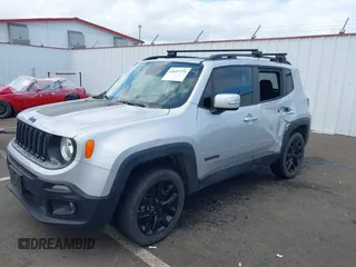 2017 Jeep Renegade Latitude with VIN ZACCJBBB5HPF68898, listed as a IAAI auction lot 41647375 with 98,270 mi miles. Bid and sale history available at carsss.com. Image 2.