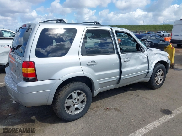 2005 Ford Escape Limited with VIN 1FMYU04165KB19009, listed as a IAAI auction lot 39055762 with 180,484 mi miles. Bid and sale history available at carsss.com. Image 4.