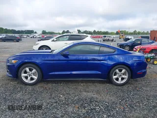 2015 Ford Mustang V6 z VIN 1FA6P8AM6F5411572, wystawiony jako IAAI lot #42377268 z przebiegiem 56 049 mil mil oraz . Historia ofert i sprzedaży dostępna na DreamBid. Obrazek 14.