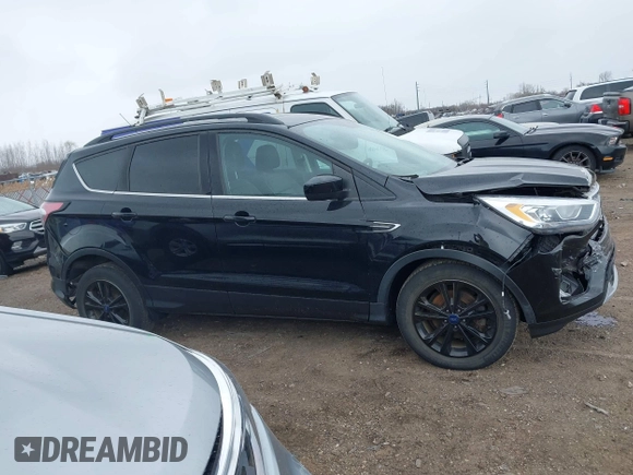 2017 Ford Escape SE with VIN 1FMCU0GD2HUD09575, listed as a IAAI auction lot 41952349 with 62,886 mi miles and . Bid and sale history available at DreamBid. Image 13.