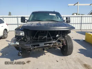 2003 GMC Sierra 1500HD SLE z VIN 1GTGK13U83F178687, wystawiony jako Copart lot #75805414 z przebiegiem Nie podano mil oraz Szkody całkowita. Historia ofert i sprzedaży dostępna na DreamBid. Obrazek 5.