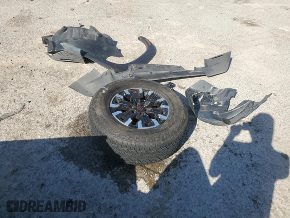 2022 Nissan Frontier Pro-X с VIN 1N6ED1EJ5NN679157, выставлен на аукционе Copart как лот 51935295 с пробегом 38 648 миль миль и Списание • Salvage title. История ставок и продаж доступна на DreamBid. Изображение 14.