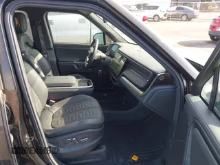 2023 Rivian R1S Adventure z VIN 7PDSGABA8PN020504, wystawiony jako IAAI lot #42025341 z przebiegiem 5989 mil mil oraz . Historia ofert i sprzedaży dostępna na DreamBid. Obrazek 5.