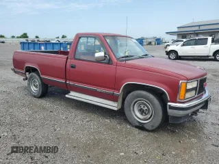 1990 GMC Sierra 1500 z VIN 1GTFC24K8LE514419, wystawiony jako Copart lot #57265335 z przebiegiem 162 045 mil mil oraz Szkoda całkowita • Salvage title. Historia ofert i sprzedaży dostępna na DreamBid. Obrazek 4.