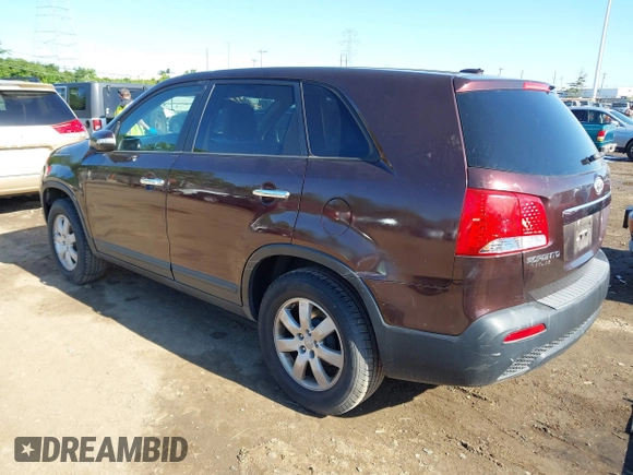 2013 Kia Sorento LX with VIN 5XYKT3A17DG375103, listed as a IAAI auction lot 42327291 with 228,761 mi miles and . Bid and sale history available at DreamBid. Image 3.