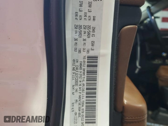 2015 Jeep Grand Cherokee Summit with VIN 1C4RJFJG1FC226591, listed as a Copart auction lot 52926115 with 130,803 mi miles and Salvage Title. Bid and sale history available at DreamBid. Image 14.