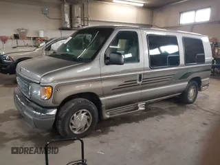 2002 Ford Econoline Cargo Recreational with VIN 1FDRE14L22HB53224, listed as a IAAI auction lot 41967017 with 202,065 mi miles. Bid and sale history available at carsss.com. Image 2.