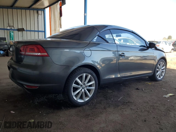 2014 Volkswagen Eos Komfort with VIN WVWBW8AH9EV006190, listed as a Copart auction lot 52390705 with 124,370 mi miles and Salvage Title. Bid and sale history available at DreamBid. Image 3.