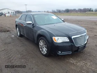 2013 Chrysler 300 with VIN 2C3CCAKG7DH619334, listed as a IAAI auction lot 41193765 with 162,662 mi miles. Bid and sale history available at carsss.com. Image 1.