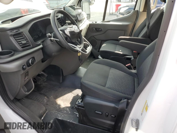 2023 Ford Transit Passenger XL with VIN 1FBAX2X86PKB35851, listed as a Copart auction lot 71126324 with 8,402 mi miles and Salvage Title. Bid and sale history available at DreamBid. Image 7.