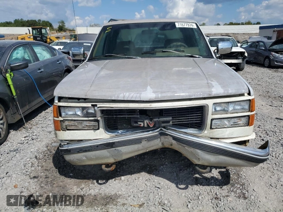 1994 GMC Sierra 1500 with VIN 1GTEC19KXRE557960, listed as a Copart auction lot 71677974 with 194,641 mi miles and Salvage Title. Bid and sale history available at DreamBid. Image 5.