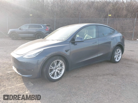 2023 Tesla Model Y Long Range with VIN 7SAYGAEEXPF612231, listed as a IAAI auction lot 41758243 with 32,924 mi miles and . Bid and sale history available at DreamBid. Image 2.