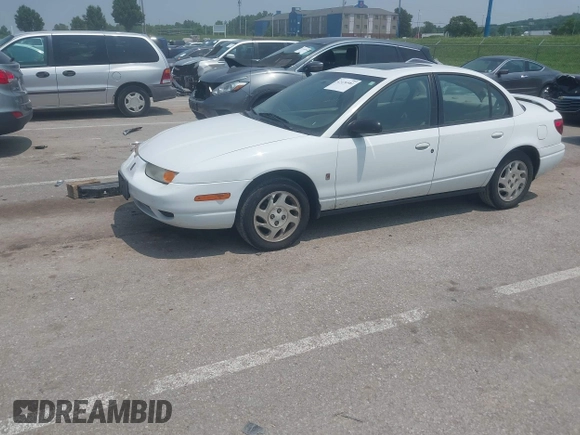 2002 Saturn SL с VIN 1G8ZK52732Z222128, выставлен на аукционе IAAI как лот 42476981 с пробегом 165 454 миль миль и . История ставок и продаж доступна на DreamBid. Изображение 2.