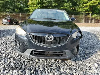 2015 Mazda CX-5 Touring with VIN JM3KE4CY4F0474732, listed as a Copart auction lot 53435334 with 134,631 mi miles and Salvage Title. Bid and sale history available at carsss.com. Image 5.
