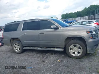 2017 Chevrolet Suburban LT with VIN 1GNSKHKC7HR356677, listed as a IAAI auction lot 42491581 with 129,496 mi miles and . Bid and sale history available at DreamBid. Image 13.