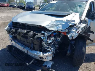 2024 Toyota bZ4X XLE z VIN JTMABACA3RA087070, wystawiony jako IAAI lot #42135035 z przebiegiem 17 498 mil mil oraz . Historia ofert i sprzedaży dostępna na DreamBid. Obrazek 6.