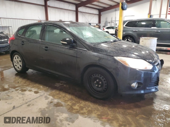 2012 Ford Focus SE z VIN 1FAHP3K24CL407570, wystawiony jako Copart lot #56002135 z przebiegiem 122 730 mil mil oraz Szkoda całkowita • Salvage title. Historia ofert i sprzedaży dostępna na DreamBid. Obrazek 4.