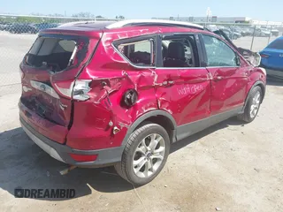 2015 Ford Escape Titanium with VIN 1FMCU0JX8FUC78607, listed as a IAAI auction lot 42000719 with 148,482 mi miles. Bid and sale history available at carsss.com. Image 4.