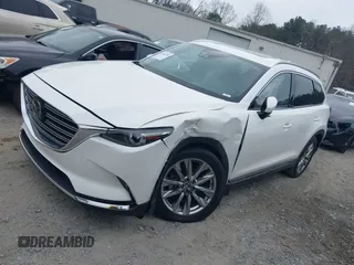 2016 Mazda CX-9 Grand Touring with VIN JM3TCADY0G0113779, listed as a IAAI auction lot 41466750 with 58,035 mi miles and . Bid and sale history available at DreamBid. Image 14.
