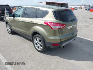 2013 Ford Escape SEL with VIN 1FMCU9H99DUC03956, listed as a IAAI auction lot 41891855 with 84,428 mi miles and . Bid and sale history available at DreamBid. Image 3.