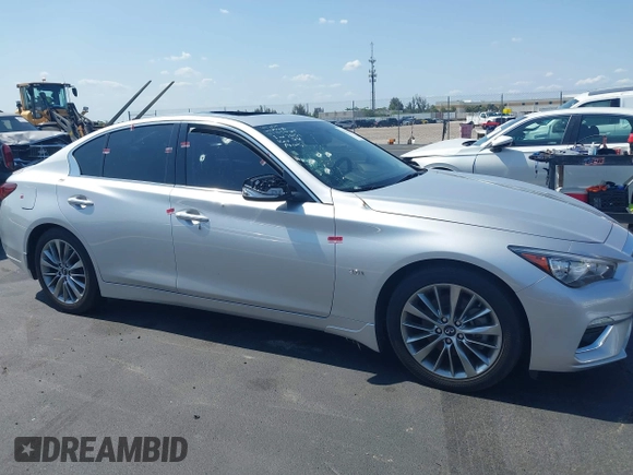 2019 Infiniti Q50 Luxe z VIN JN1EV7AP3KM510305, wystawiony jako IAAI lot #42225255 z przebiegiem 33 902 mil mil oraz . Historia ofert i sprzedaży dostępna na DreamBid. Obrazek 6.