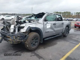 2021 Ram 1500 Rebel with VIN 1C6SRFLT0MN734774, listed as a IAAI auction lot 41075676 with 95,808 mi miles and . Bid and sale history available at DreamBid. Image 2.