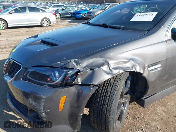 2009 Pontiac G8 GT with VIN 6G2EC57YX9L221534, listed as a IAAI auction lot 41227662 with 130,941 mi miles. Bid and sale history available at carsss.com. Image 6.