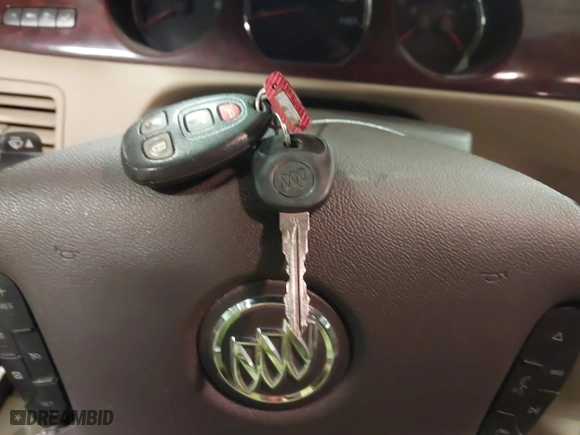 2010 Buick Lucerne CXL with VIN 1G4HC5EM4AU122627, listed as a IAAI auction lot 41836235 with 134,337 mi miles. Bid and sale history available at carsss.com. Image 11.