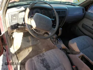 1998 Toyota Tacoma with VIN 4TAWN72N6WZ061060, listed as a Copart auction lot 49701815 with 215,295 mi miles and Clean Title. Bid and sale history available at DreamBid. Image 8.