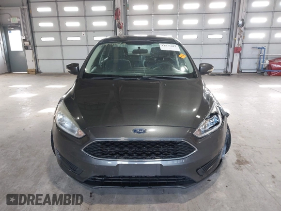 2017 Ford Focus SE with VIN 1FADP3F29HL220440, listed as a IAAI auction lot 41975013 with 40,295 mi miles and . Bid and sale history available at DreamBid. Image 12.