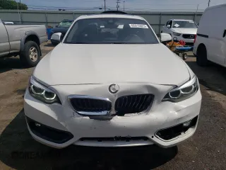 2019 BMW 2 Series 230i xDrive with VIN WBA2J3C50K7D27538, listed as a Copart auction lot 65215523 with 26,910 mi miles. Bid and sale history available at carsss.com. Image 5.