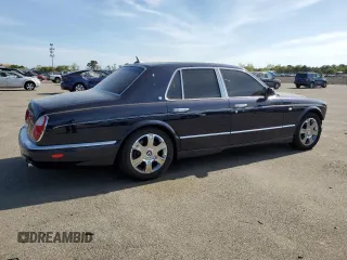 2005 Bentley Arnage R z VIN SCBLC37F15CX10517, wystawiony jako Copart lot #54303364 z przebiegiem 116 865 mil mil oraz Szkody całkowita. Historia ofert i sprzedaży dostępna na DreamBid. Obrazek 3.