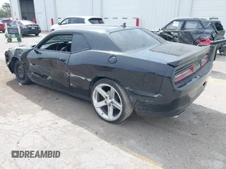 2016 Dodge Challenger R/T Plus with VIN 2C3CDZBT7GH177992, listed as a IAAI auction lot 42136475 with 132,808 mi miles and . Bid and sale history available at DreamBid. Image 3.