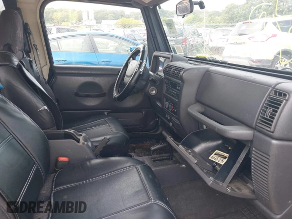 2001 Jeep Wrangler Sport with VIN 1J4FA49S91P330175, listed as a IAAI auction lot 40133432 with 999,999 mi miles. Bid and sale history available at carsss.com. Image 5.