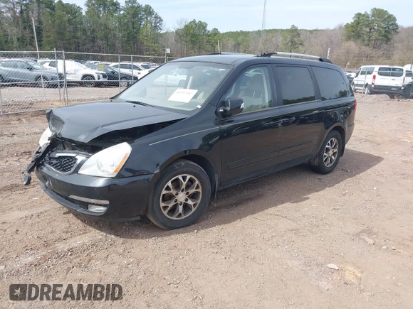 2014 Kia Sedona LX with VIN KNDMG4C7XE6586613, listed as a IAAI auction lot 41597187 with 211,851 mi miles. Bid and sale history available at carsss.com. Image 2.
