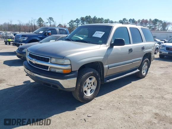 2003 Chevrolet Tahoe LS z VIN 1GNEK13T13J144304, wystawiony jako IAAI lot #41784000 z przebiegiem 363 478 mil mil oraz . Historia ofert i sprzedaży dostępna na DreamBid. Obrazek 2.