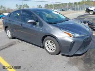 2021 Toyota Prius L Eco with VIN JTDKAMFU4M3134778, listed as a IAAI auction lot 41843429 with 145,757 mi miles. Bid and sale history available at carsss.com. Image 1.