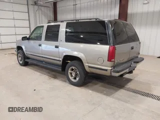 1999 GMC Suburban with VIN 3GKGK26J0XG537434, listed as a IAAI auction lot 41787267 with 180,439 mi miles. Bid and sale history available at carsss.com. Image 3.