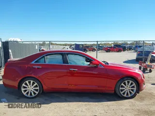 2014 Cadillac ATS Luxury AWD with VIN 1G6AH5RX0E0176647, listed as a IAAI auction lot 40939517 with 103,348 mi miles and . Bid and sale history available at DreamBid. Image 13.