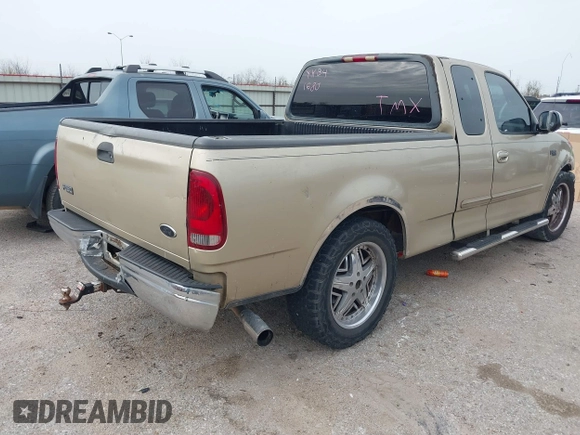 2000 Ford F-150 XL with VIN 1FTZX1725YKB41680, listed as a IAAI auction lot 41736655 with 1 mi miles. Bid and sale history available at carsss.com. Image 4.